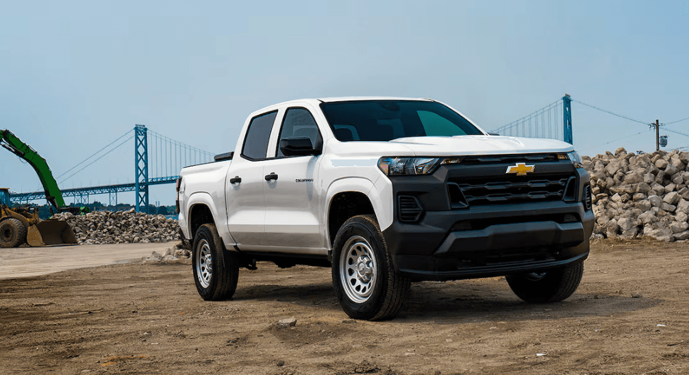 White Chevy Colorado work truck on a job site — Summit Auto Glass fleet and commercial service
